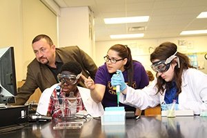 Jan Halámek (left) and UAlbany Ph.D. student Juliana Agudelo (one from right) are working with Averill Park high school students on both discoveries. (Photo by Gregory Panzanaro)