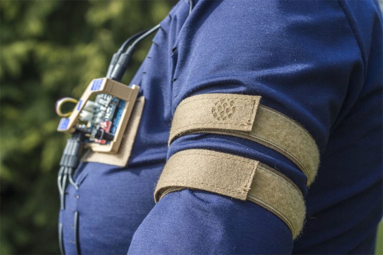 3D prints and laser-cut icons on the meditation suit’s fabric indicate where the sensors and cable connections are located.