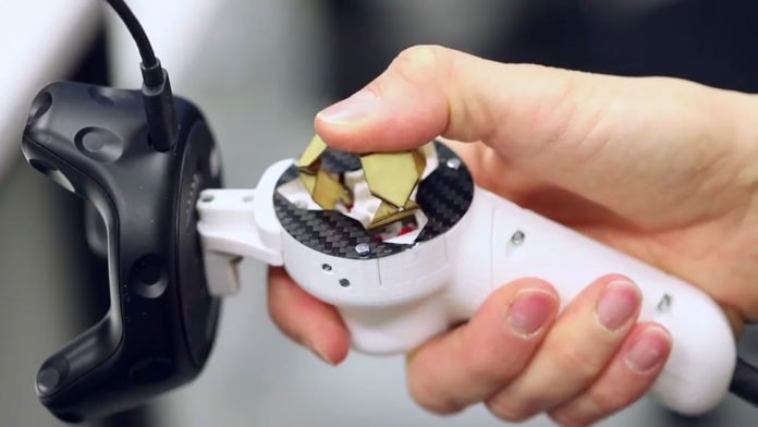 Foldaway Touch, a haptic button for virtual reality joysticks