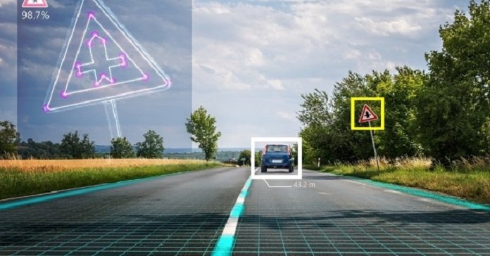Autonomous self-driving car is recognizing road signs. Computer vision and artificial intelligence concept.