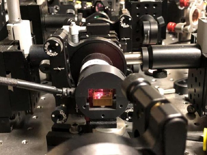A device developed by NIST, seen here, converts laser light into pairs of “entangled” photons that researchers then measure to generate a string of truly random numbers. (Credit: Shalm/NIST)