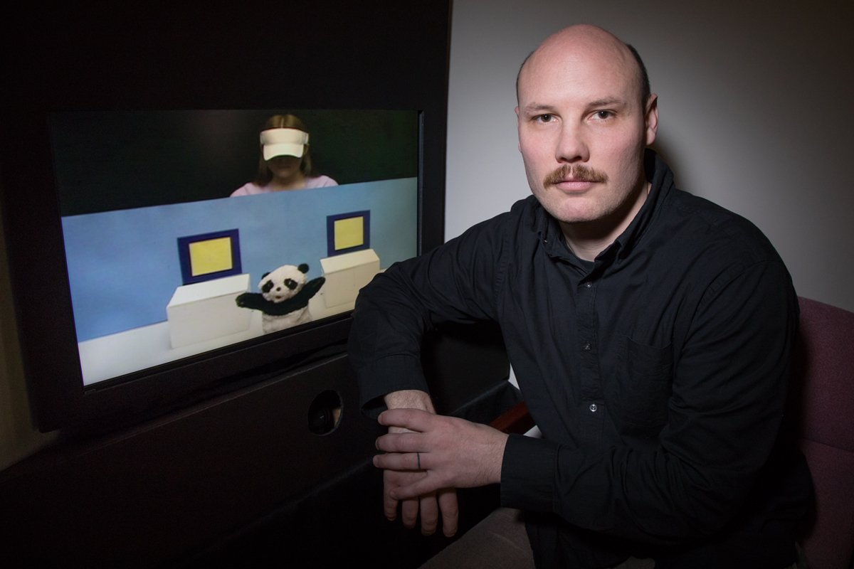 Psychology professor Daniel Hyde uses brain imaging to study infant cognition. In a new study, he found evidence to support the idea that infants have a basic knowledge of other people’s mental states.  Photo by L. Brian Stauffer