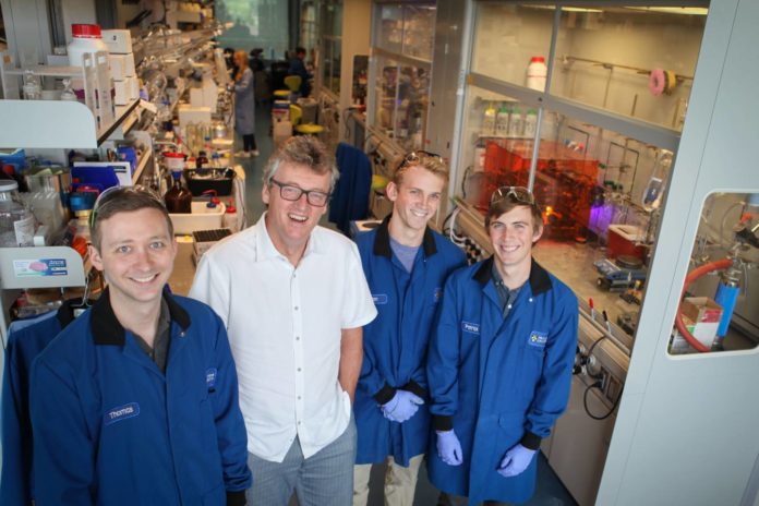 Princeton researchers have found ways to bond molecules “like Legos,” theoretically allowing new medicines to be assembled faster and with more flexibility. The research team includes (from left): postdoctoral research associate Thomas Brewer; David MacMillan, the James S. McDonnell Distinguished University Professor of Chemistry; and graduate students Ian Perry and Patrick Sarver. Photo byC. Todd Reichart, Department of Chemistry
