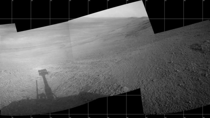 About 11 months before the current dust storm enveloped the rover, Opportunity took five images that were turned into a mosaic showing a view from inside the upper end of 