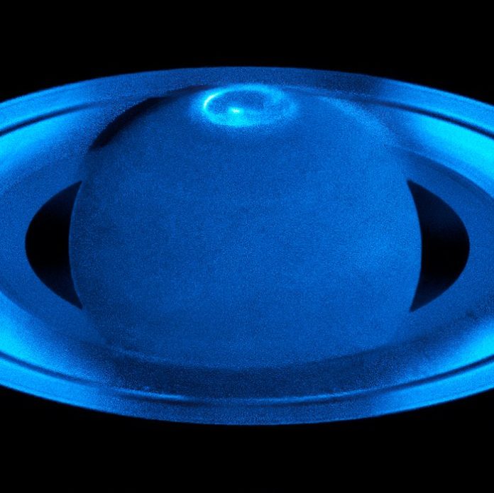 The image, observed with the Space Telescope Imaging Spectrograph in the ultraviolet, shows the auroras surrounding Saturn’s north pole region. In comparing the different observations it became clear that Saturn’s auroras show a rich variety of emissions with highly variable localised features. The variability of the auroras is influenced by both the solar wind and the rapid rotation of Saturn.