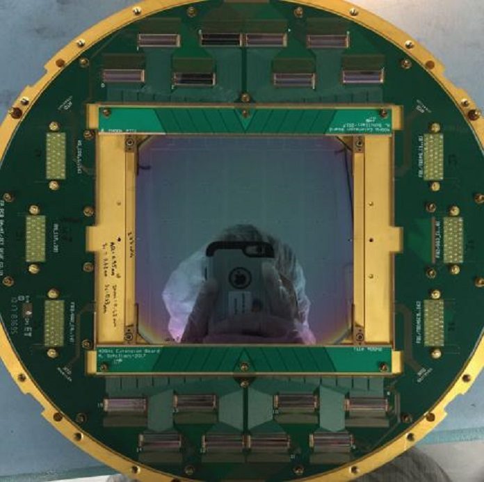 The first detector antenna-coupled, transition-edge superconducting arrays developed for 40 GHz on 150-mm diameter wafers for larger formats. The array is shown mounted in a test focal-plane assembly.