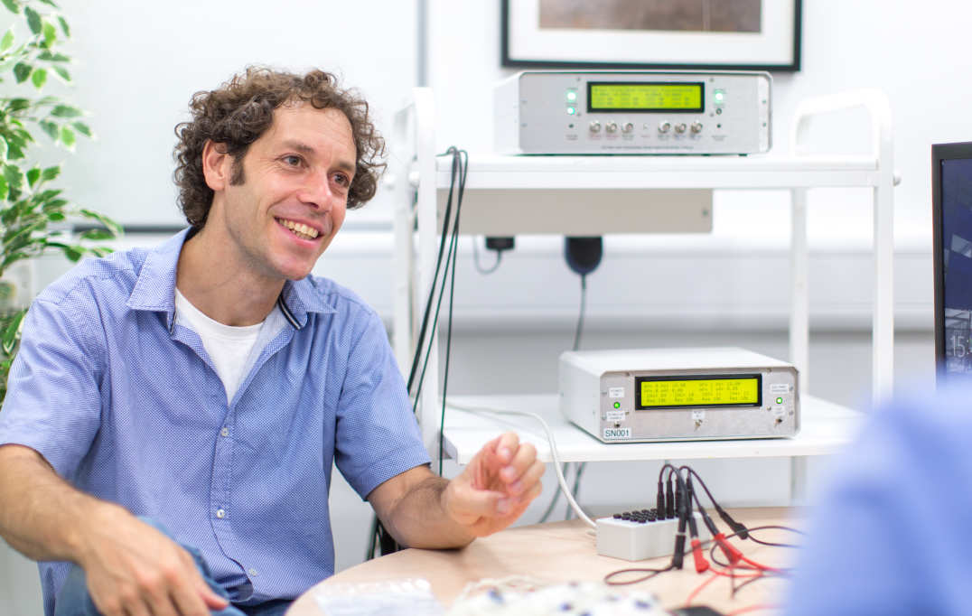 Dr Nir Grossman pictured) is investigating a new a new way to stimulate the brain which he hopes could offer an alternative for huge number of patients in need