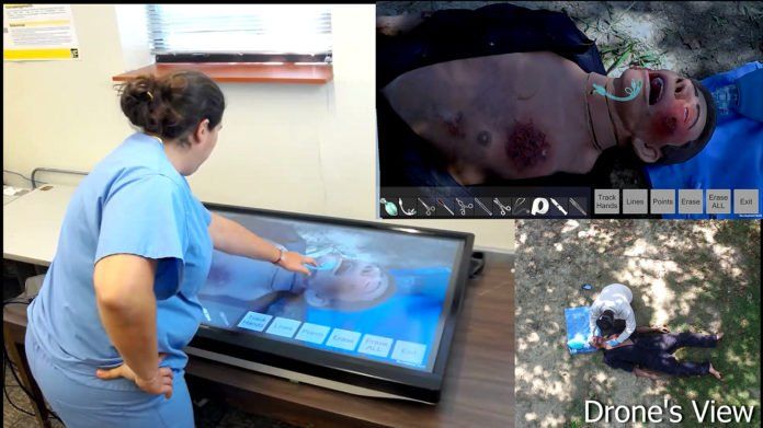 Purdue University researchers have developed a unique approach using augmented reality tools to help less-experienced doctors in war zones, natural disasters and in rural areas perform complicated procedures. (Image provided)