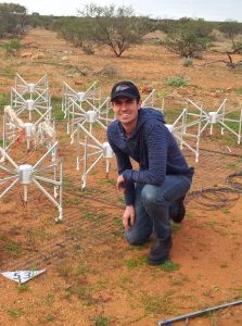 Dr Benjamin McKinley during a trip to the Murchison Widefield Array telescope in outback Western Australia. The 16 metal ‘spiders’ form a single antenna ‘tile’, of which there are 256, spread out across an area of around 6 km in diameter. Dr McKinley and the team are using this radio telescope to observe the Moon in their search for radio signals from the early Universe.