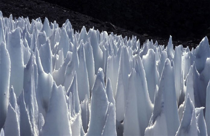 Ice spikes – aka penitentes – on the Upper Rio Blanco in the Central Andes of Argentina. Similar ice spikes could exist on the surface of Jupiter’s moon Europa, at its equatorial latitudes.