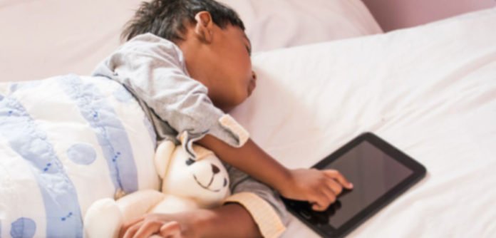 Screen-time has little impact on children’s sleep, according to new Oxford University research