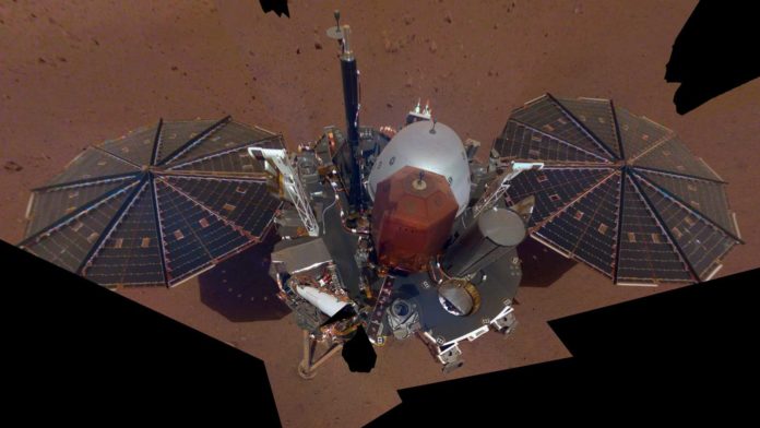 This is NASA InSight's first selfie on Mars. It displays the lander's solar panels and deck. On top of the deck are its science instruments, weather sensor booms and UHF antenna. The selfie was taken on Dec. 6, 2018 (Sol 10). Credits: NASA/JPL-Caltech