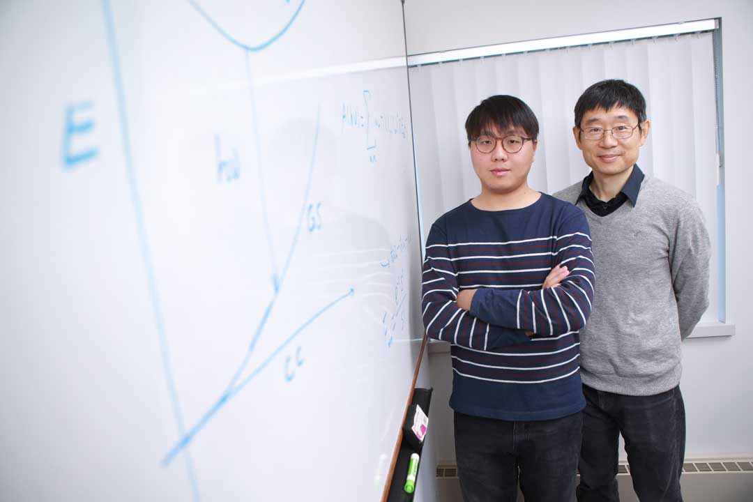 Dr. Xiaoming Wang, left, and Dr. Yanfa Yan, right
