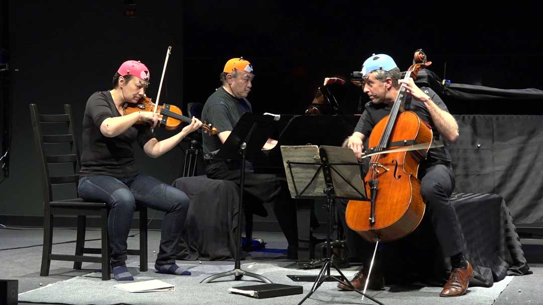 Members of the Gryphon Trio perform while scientists measure their movements. Credit: LIVELab, McMaster University