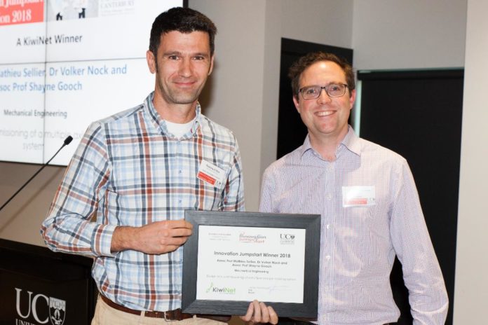 UC Professor Mathieu Sellier receives Innovation Jumpstart award from KiwiNet CEO James Hutchinson.