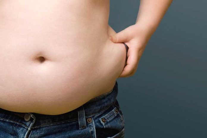 Excessive body fat around the middle linked to smaller brain size