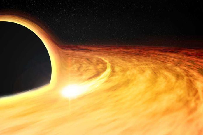 This artist's impression shows hot gas orbiting in a disk around a rapidly-spinning black hole. The elongated spot depicts an X-ray-bright region in the disk, which allows the spin of the black hole to be estimated. Image: NASA/CXC/M. Weiss