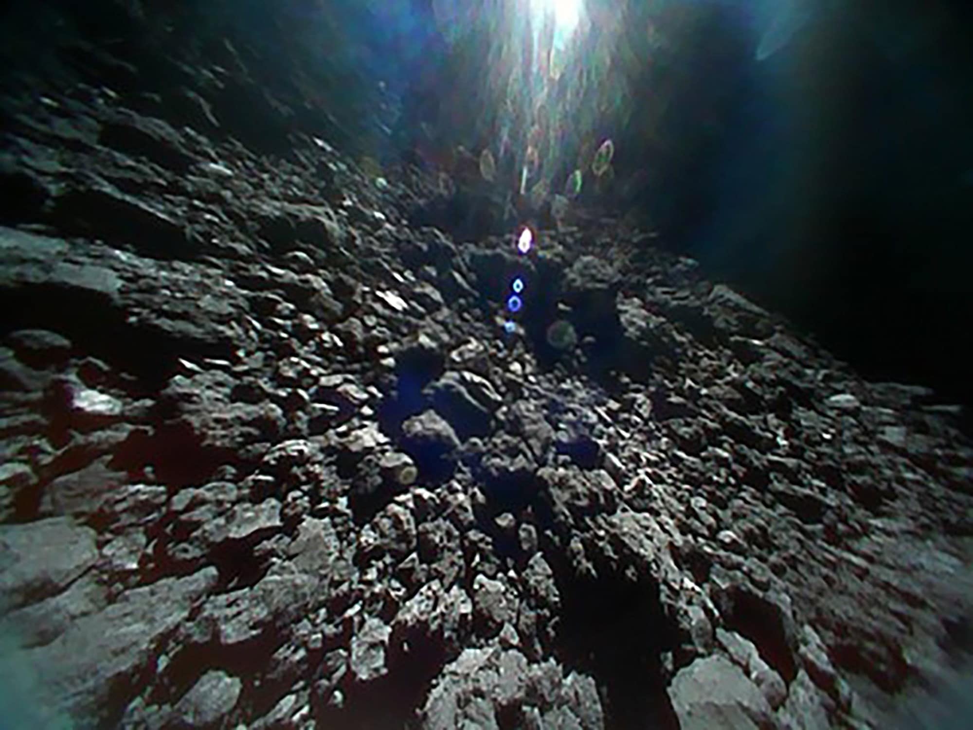 This photo of the asteroid Ryugu's surface was captured on Sept. 28, 2018 by one of the rovers released by Japan's Hayabusa 2 spacecraft.HANDOUT / AFP - Getty Images