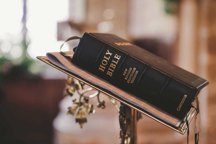 Who is most likely to take the bible literally? Men or women?
