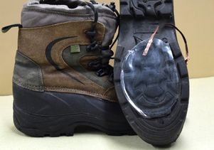 Hiking shoe with device attached