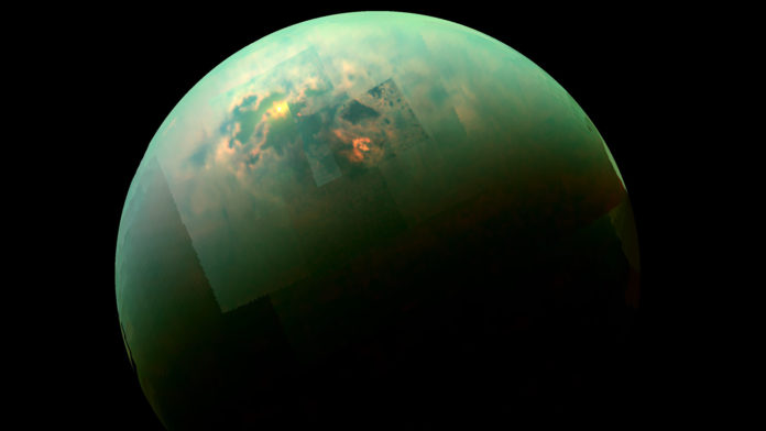 This near-infrared, color view from Cassini shows the sun glinting off of Titan's north polar seas. Image credit: NASA/JPL-Caltech/Univ. Arizona/Univ. Idaho