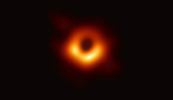 Scientists have obtained the first image of a black hole, using Event Horizon Telescope observations of the center of the galaxy M87. The image shows a bright ring formed as light bends in the intense gravity around a black hole that is 6.5 billion times more massive than the Sun. This long-sought image provides the strongest evidence to date for the existence of supermassive black holes and opens a new window onto the study of black holes, their event horizons, and gravity. Credit: Event Horizon Telescope Collaboration