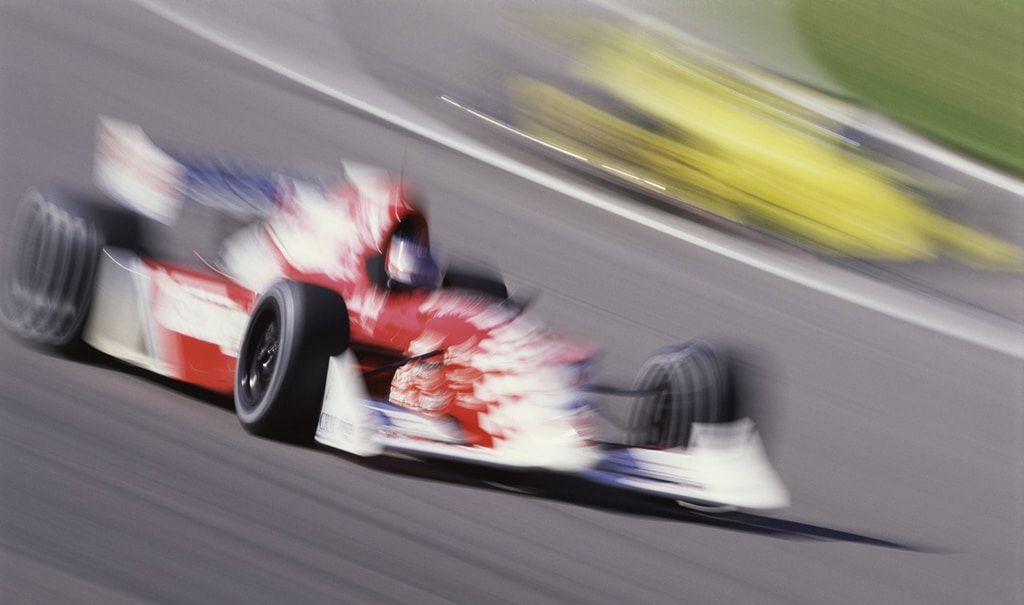 Racing Car in Motion --- Image by © Royalty-Free/Corbis