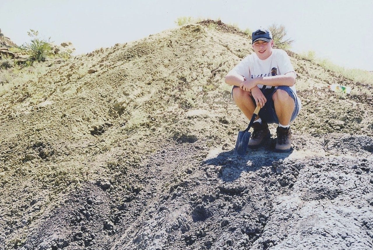 Sterling Nesbitt at age 16 in western New Mexico, where he found the fossil remains of what would be named Suskityrannus hazelae. Photo by Hazel Wolfe.