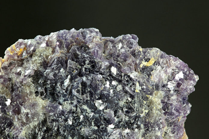 A sample of the mineral lepidolite, a key source of lithium, mined in Finland. Credit: iStock/ekakoskinen