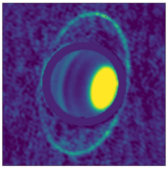 Composite image of Uranus’s atmosphere and rings at radio wavelengths, taken with the ALMA array in December 2017. The image shows thermal emission, or heat, from the rings of Uranus for the first time, enabling scientists to determine their temperature: a frigid 77 Kelvin (-320 F). Dark bands in Uranus’s atmosphere at these wavelengths show the presence of molecules that absorb radio waves, in particular hydrogen sulfide gas. Bright regions like the north polar spot (yellow spot at right, because Uranus is tipped on its side) contain very few of these molecules. Credit: UC Berkeley image by Edward Molter and Imke de Pater