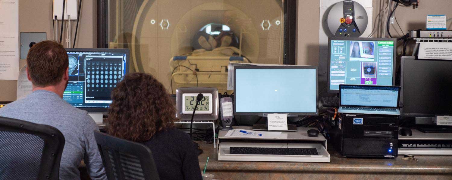 Researchers use fMRI brain imaging technology at CU Boulder. (Credit: Glenn Asakawa/CU Boulder)