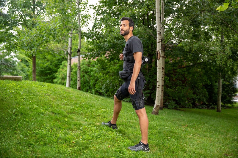 The light-weight versatile exosuit assists hip extension during uphill walking and at different running speeds in natural terrain. / Image Credit: Wyss Institute at Harvard University