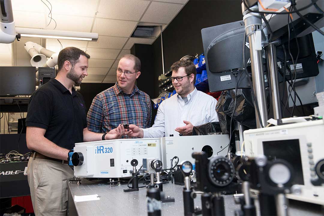 Michael Fanto (left), an RIT microsystems engineering Ph.D. student and the experimental lead for the Air Force Research Laboratory Quantum Information Science group; James Schneeloch (center), a postdoctoral researcher with the Air Force Research Laboratory U.S. Air Force; and Gregory Howland (right), RIT assistant professor, were among the researchers to develop a new technique to measure quantum entanglement.