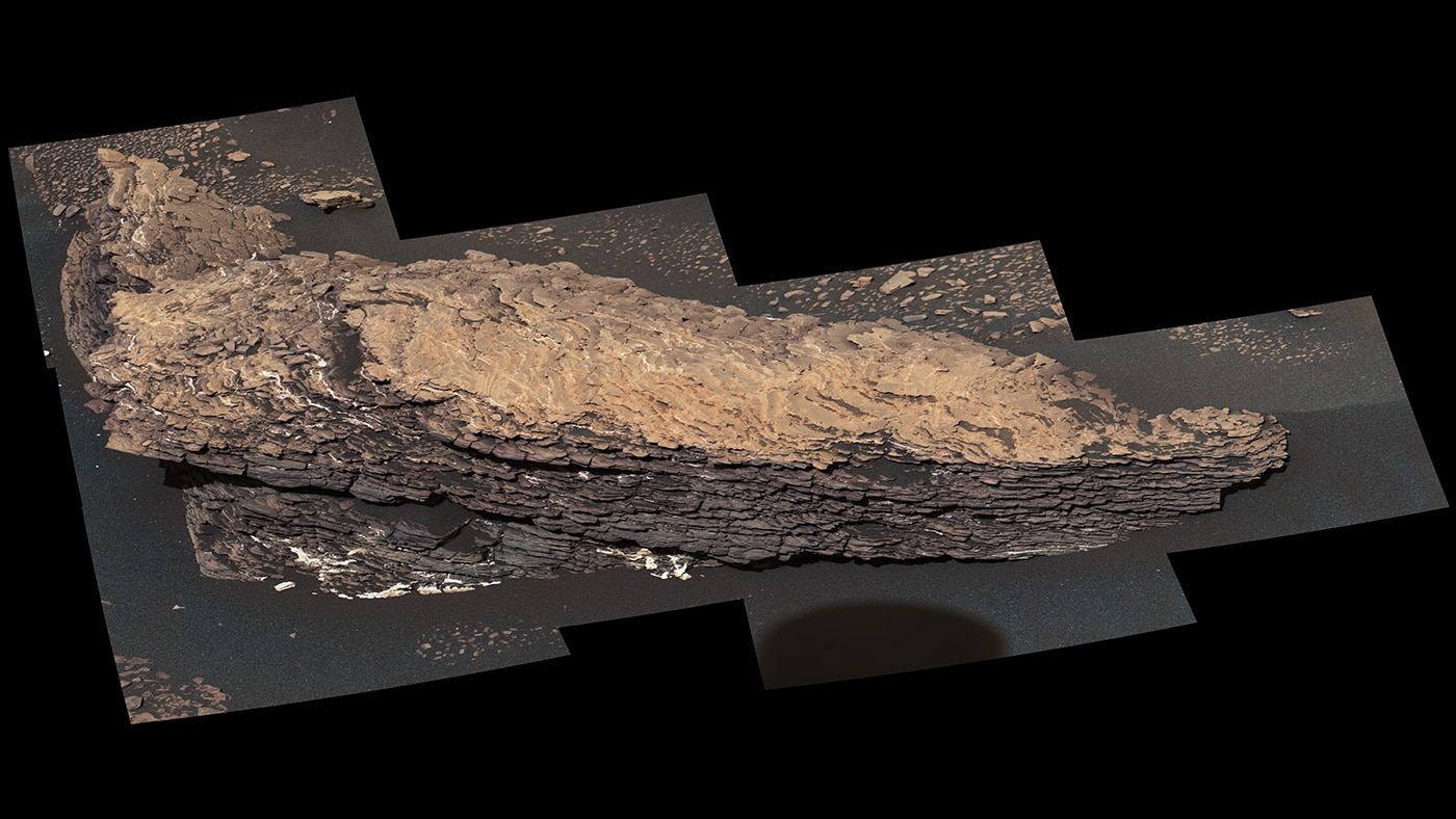 This mosaic of images shows a boulder-sized rock called "Strathdon," which is made up of many complex layers. NASA's Curiosity Mars rover took these images using its Mast Camera, or Mastcam, on July 9, 2019, the 2,461st Martian sol, or day, of the mission. Credits: NASA/JPL-Caltech/MSSS