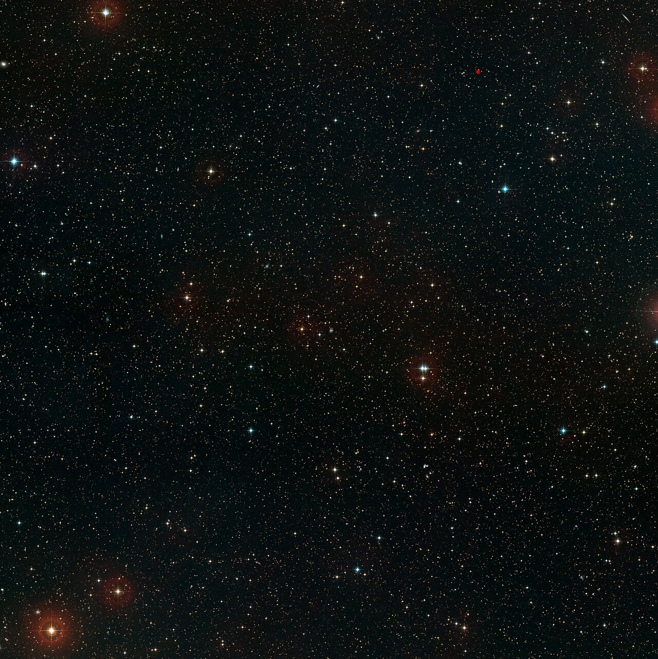This image shows a ground-based wide-field view of the region around NGC 6752 from the Digitized Sky Survey 2.  Credit:ESA/Digitized Sky Survey 2 Acknowledgement: Davide De Martin