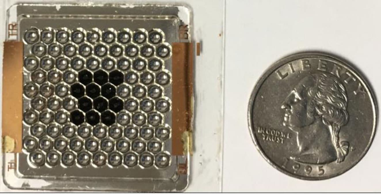 A new solar power generator prototype developed by Ben-Gurion University of the Negev (BGU) and research teams in the United States, will be deployed on the first 2020 NASA flight launch to the International Space Station. The first prototype pictured here holds 90 miniaturized solar concentrators, and shows 12 solar cells with the concentrators in black. CREDIT Ben-Gurion U./Jeffery Gordon