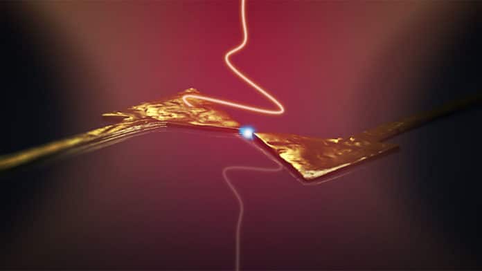 Illustration of how electrons can be imagined to move between two arms of a metallic nanoantenna, driven by a single-cycle light wave. Credit: University of Konstanz