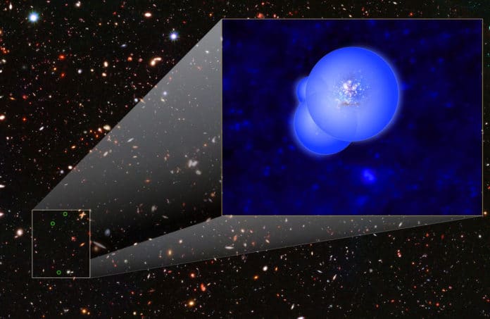 This illustration of the EGS77 galaxy group shows the galaxies surrounded by overlapping bubbles of ionized hydrogen. By transforming light-quenching hydrogen atoms to ionized gas, ultraviolet starlight is thought to have formed such bubbles throughout the early universe, gradually transitioning it from opaque to completely transparent. Background: This composite of archival Hubble Space Telescope visible and near-infrared images includes the three galaxies of EGS77 (green circles). Credits: NASA, ESA and V. Tilvi (ASU)