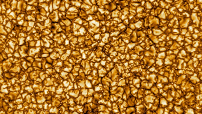 The Daniel K. Inouye Solar Telescope has produced the highest resolution image of the Sun’s surface ever taken. In this picture taken at 789nm, we can see features as small as 30km (18 miles) in size for the first time ever. The image shows a pattern of turbulent, “boiling” gas that covers the entire sun. The cell-like structures – each about the size of Texas – are the signature of violent motions that transport heat from the inside of the sun to its surface. Hot solar material (plasma) rises in the bright centers of “cells,” cools off and then sinks below the surface in dark lanes in a process known as convection. In these dark lanes we can also see the tiny, bright markers of magnetic fields. Never before seen to this clarity, these bright specks are thought to channel energy up into the outer layers of the solar atmosphere called the corona. These bright spots may be at the core of why the solar corona is more than a million degrees!