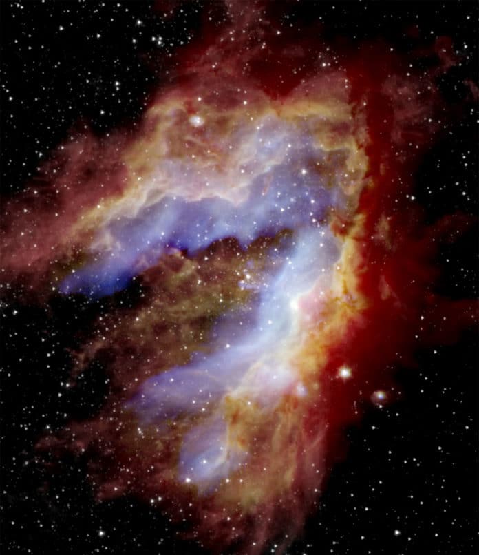 Composite image of the Swan Nebula. SOFIA detected the blue areas (20 microns) near the center, revealing gas as it’s heated by massive stars located at the center and the green areas (37 microns) that trace dust as it’s warmed both by massive stars and nearby newborn stars. The nine never-before-seen protostars were found primarily in the southern areas. The red areas near the edge represent cold dust that was detected by the Herschel Space Telescope (70 microns), while the white star field was detected by the Spitzer Space Telescope (3.6 microns). The space telescopes could not observe the blue and green regions in such detail because the detectors were saturated. SOFIA’s view reveals evidence that parts of the nebula formed separately to create the swan-like shape seen today. Credits: NASA/SOFIA/De Buizer/Radomski/Lim; NASA/JPL-Caltech; ESA/Herschel