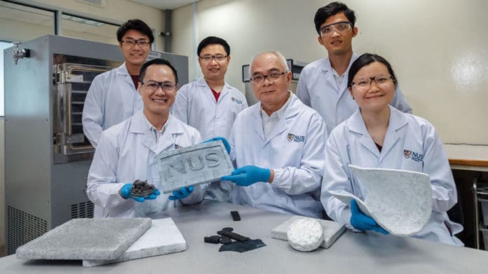 A team of NUS researchers led by Assoc Prof Duong Hai-Minh (front row, first from left) and Prof Nhan Phan-Thien (front row, centre), developed the world’s first aerogels made from scrap rubber tyres