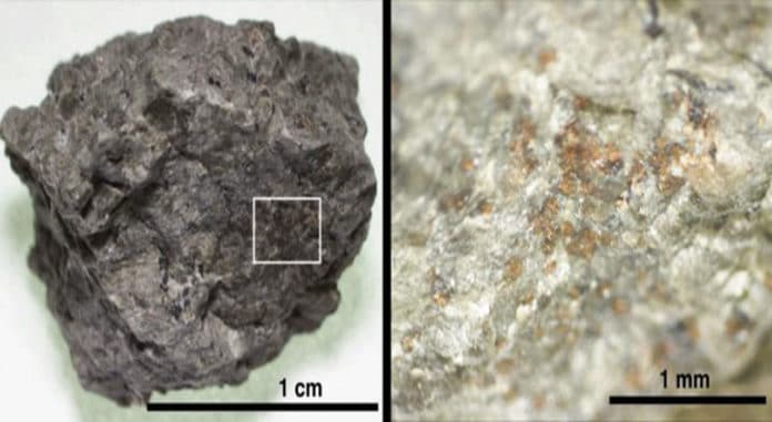 A rock fragment of Martian meteorite ALH 84001 (left). An enlarged area (right) shows the orange-coloured carbonate grains on the host orthopyroxene rock. CREDIT Koike et al. (2020) Nature Communications.