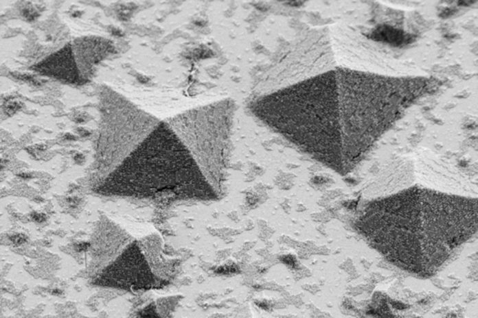 The process of how crystals form on a flat surface, as shown in this electron microscope image, has been difficult to study in detail until now. Image courtesy of Robert Macfarlane