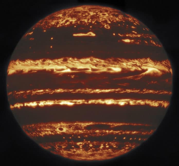 This image showing the entire disk of Jupiter in infrared light was compiled from a mosaic of nine separate pointings observed by the international Gemini Observatory, a program of NSF's NOIRLabon 29 May 2019. From a 