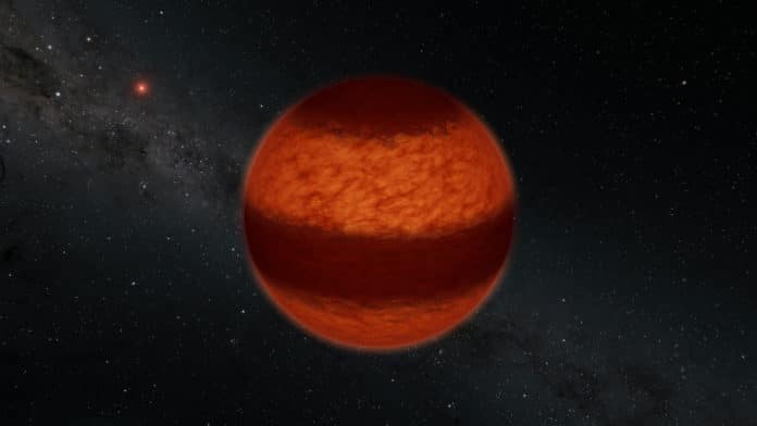 Astronomers have found evidence for a striped pattern of clouds on the brown dwarf called Luhman 16A, as illustrated here in this artist's concept. The bands of clouds were inferred using a technique called polarimetry, in which polarized light is measured from an astrophysical object much like polarized sunglasses are used to block out glare. This is the first time that polarimetry has been used to measure cloud patterns on a brown dwarf. The red object in the background is Luhman 16B, the partner brown dwarf to Luhman 16A. Together, this pair is the closest brown dwarf system to Earth at 6.5 light-years away. Credit: Caltech/R. Hurt (IPAC)