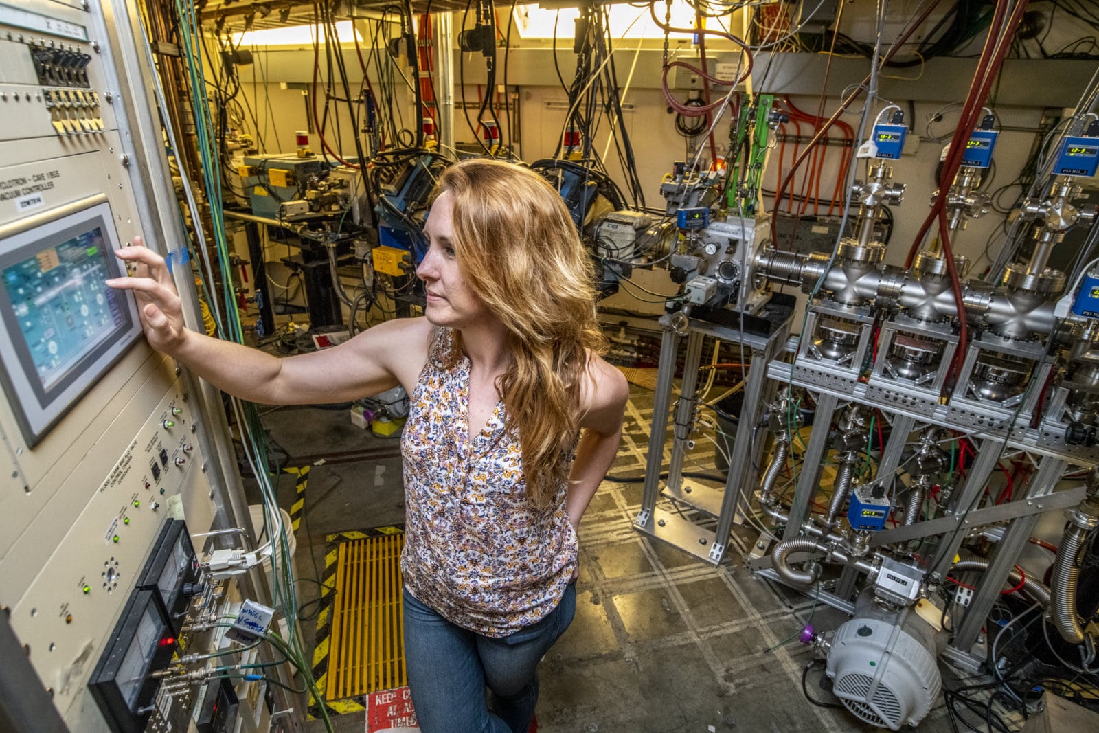 Jennifer Pore, a Berkeley Lab project scientist who led the study detailing the discovery of mendelevium-244, operates the Berkeley Gas-filled Separator vacuum controller at Berkeley Lab's 88-Inch Cyclotron in this 2018 photo