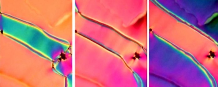 The colors in this newly discovered phase of liquid crystal shift as researchers apply a small electric field