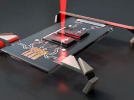 Laser jolts microscopic electronic robots into motion.