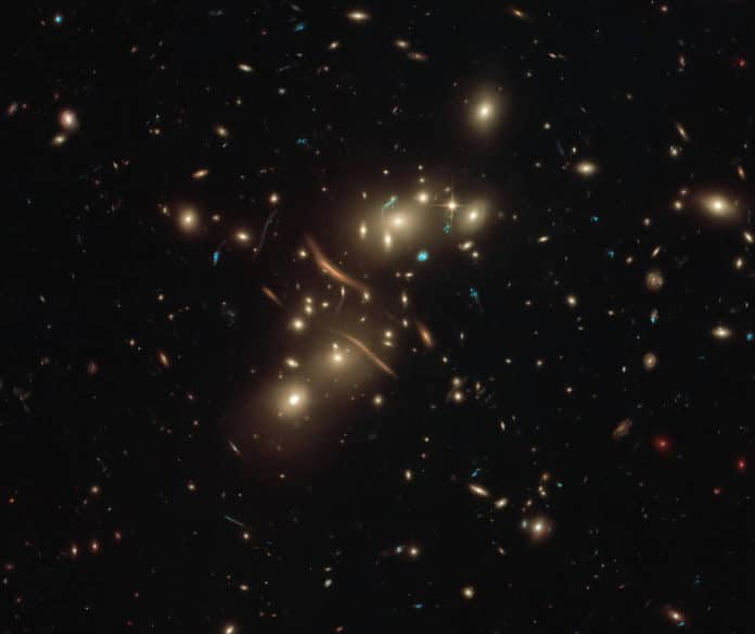 Hubble recently captured an almost delicate beauty of a galaxy cluster