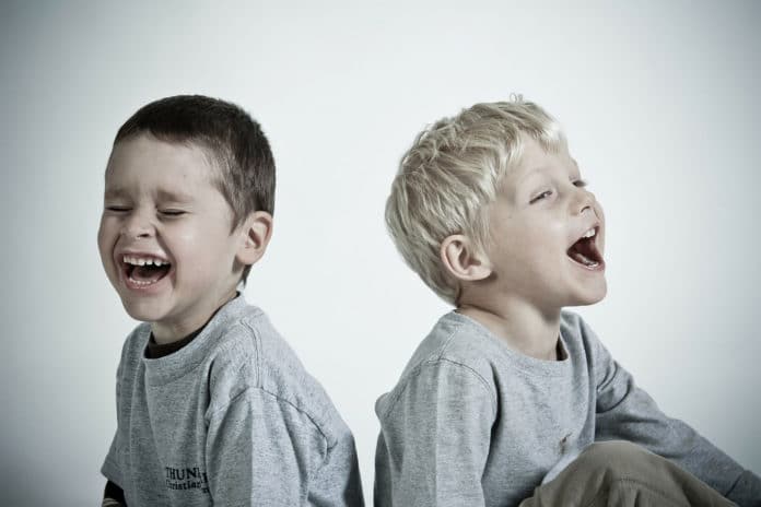 Image showing two kids laughing